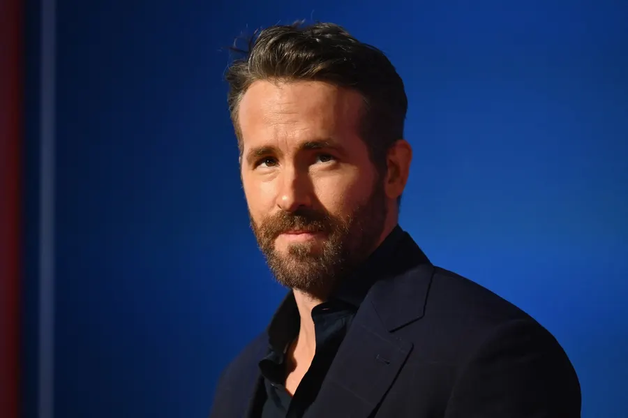 Actor Ryan Reynolds turns 50 as his business empire expands