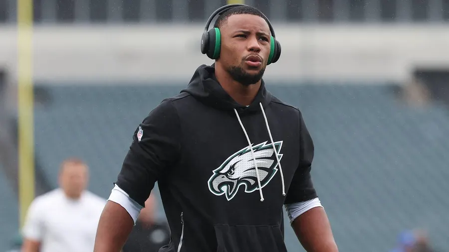 Eagles RB Saquon Barkley sidelined by hamstring as trade talk builds