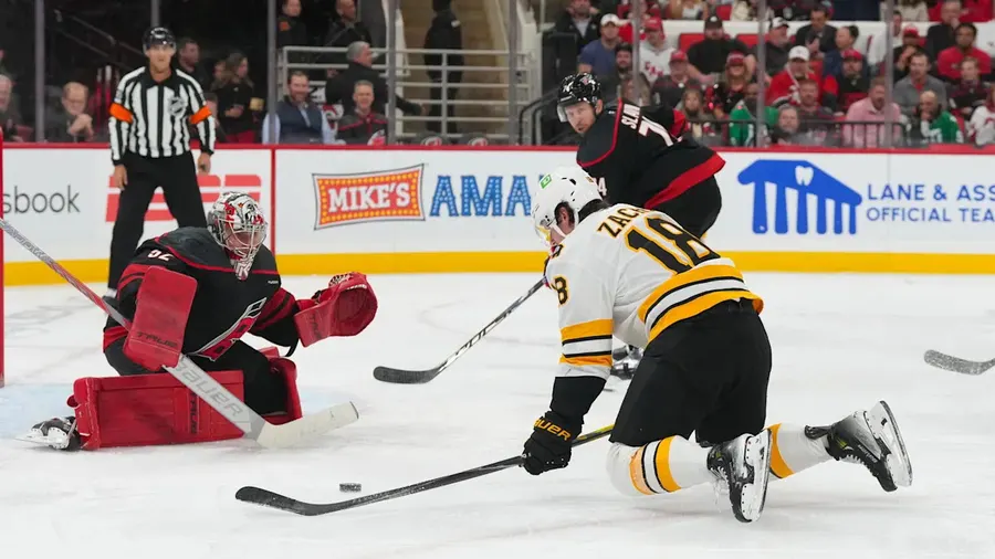 Bruins beat Sharks 6-4 with four-goal third period