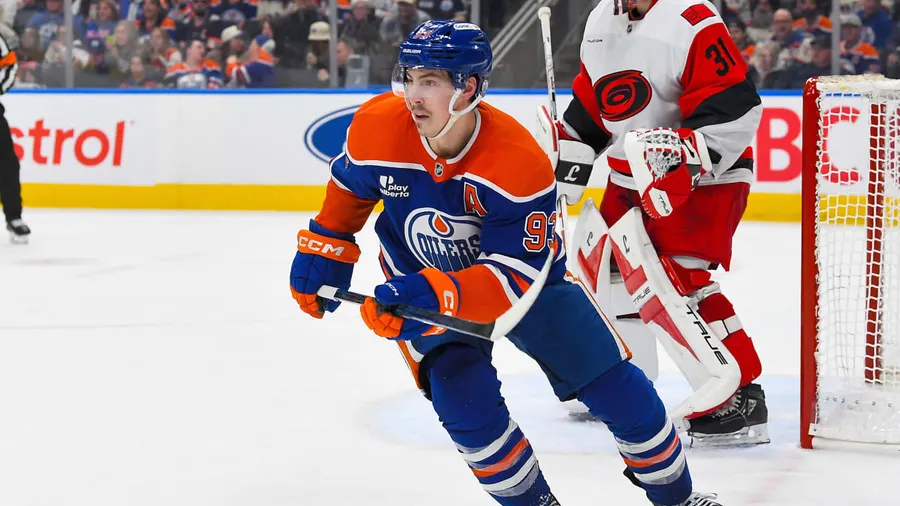 Hurricanes visit Oilers with both teams atop early standings