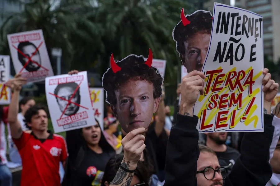Protesters rally at Meta office depicting Zuckerberg as devil
