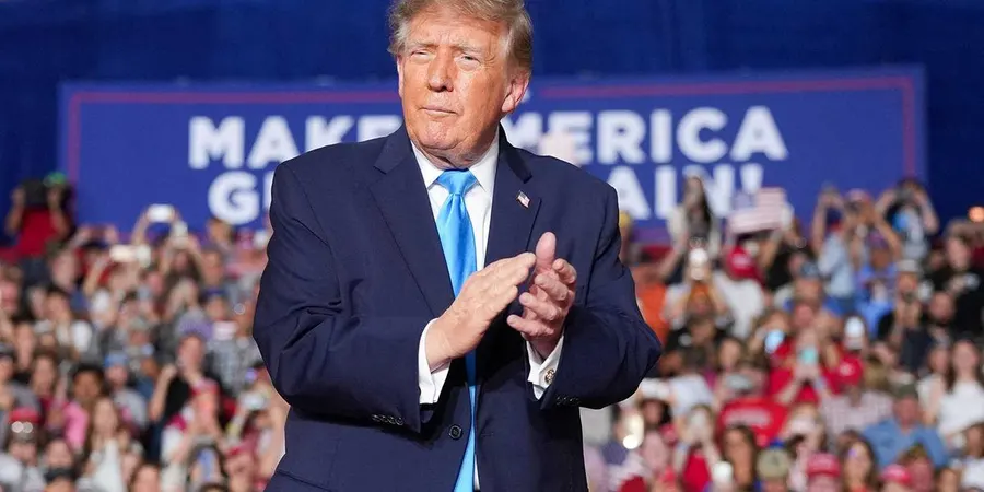 Woman punched after heckling Trump; no charges filed